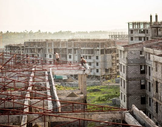 Addis has run out of space’: Ethiopia’s radical redesign Two construction workers in Koye, the largest condominium site under construction outside Addis Abeba. Photograph: Charlie Rosser
