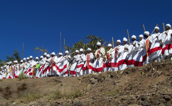 The clergy and Debtera (scholars versed in the liturgy and music of the church) lift their voices in hymn and chant just as it has been for over a 1,500 years when Ethiopia accepted Christianity.