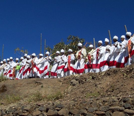 The clergy and Debtera (scholars versed in the liturgy and music of the church) lift their voices in hymn and chant just as it has been for over a 1,500 years when Ethiopia accepted Christianity.