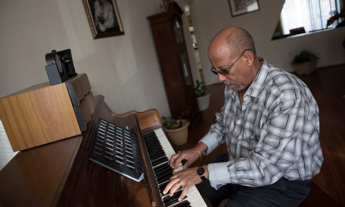Hailu Mergia at home: ‘The Lady Is a Tramp – I love that one! My favourite is old jazz.’ Photograph: Sait Serkan Gurbuz for the Guardian